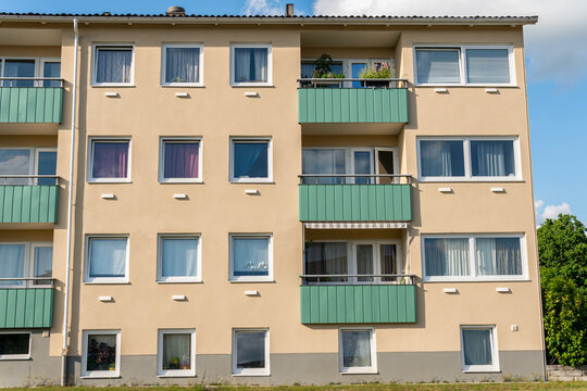 Typical Residential Building In Sweden. Modern Stylish European Architecture. House From Bricks. Balconies.