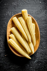 Preserved corn on a plate.