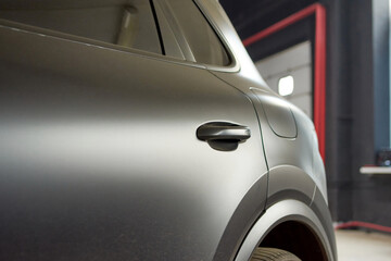 Installation of a protective paint and varnish matte film on the car. The PPF polyurethane film...