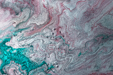 Elegant marble metallic silver background,make from liquid nail polishes.Textured surface,looks like reptile skin.Good as cosmetics backdrop.