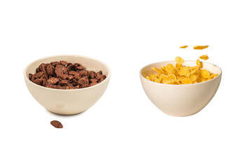 Corn flakes falling to the white bowl. Motion.