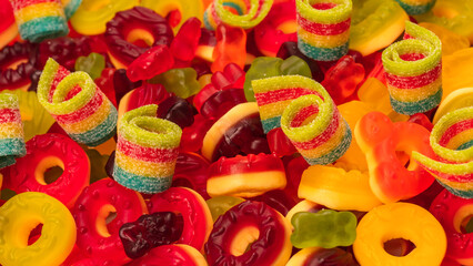Fototapeta na wymiar Assorted colorful gummy candies. Top view. Jelly donuts.