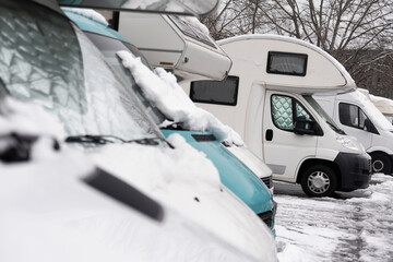 Snowy motorhome parking in winter - obrazy, fototapety, plakaty