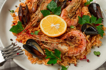 Seafood paella, shrimp and mussels risotto, rice, homemade, top view, no people,