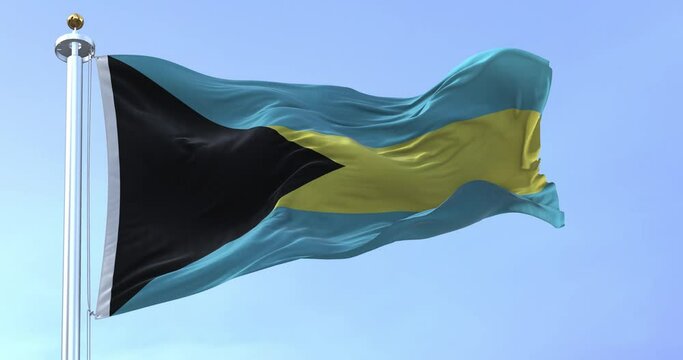 Close-up view of the Bahamas national flag waving in the wind
