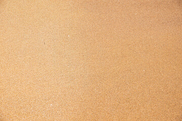 Close up beach sand texture. Sand nature pattern. Beach sand texture in summer sun.