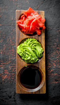 Wasabi, marinated ginger and soy sauce for Japanese sushi.