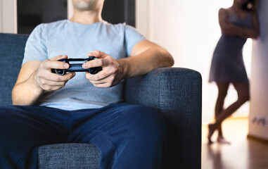 Couple having problem with video games. Girlfriend jealous of technology. Distant marriage,...