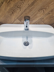 washbasin with faucet in the bathroom or toilet. plumbing for the home and public restrooms.