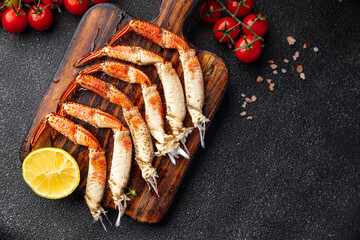 crab claws crustacean fresh seafood snack meal food on the table copy space food background rustic top view © Alesia Berlezova