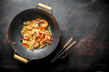 Freshly cooked Asian Udon noodles with vegetables and shrimp.
