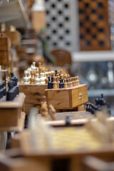 handmade chess game set made by a man with his feet.