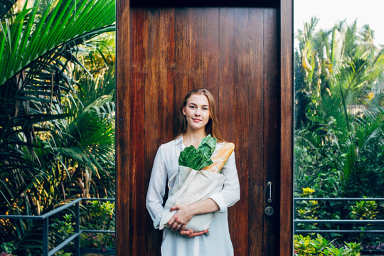 Woman Holding a Tote Bag