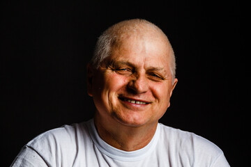Obraz premium close-up portrait of happy senior man.