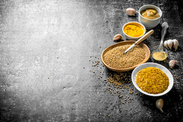 Different kinds of mustard with garlic.