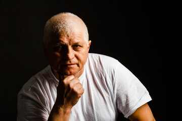 Naklejka premium close-up portrait of happy senior man.