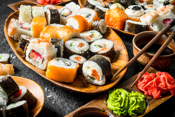 Pieces of delicious sushi, rolls and maki.