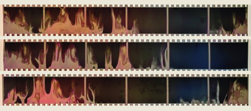 Old fashioned 35mm filmstrip or retro negative film with burned surface isolated on white. Real analog film scan with signs of usage. Dirty film material. 