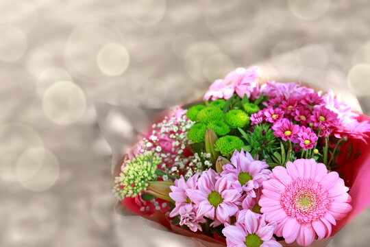 Colorful mixed flower bouquet isolated on blur background.