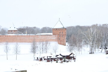 Old red bricks castle in snow