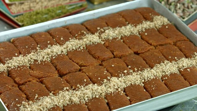 Traditional turkish baklava pistachio pastry. Dilberdudagi, ozel kesim baklava, cikolatali baklava, fistikli baklava, katmer, fistikli kadayif, kattafi, fistik sarma, soguk baklava, midye baklava, cev