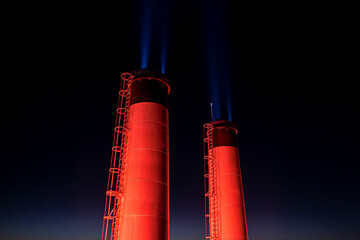 Smokestacks at night found at the Plant Riverside District in Savannah, Georgia