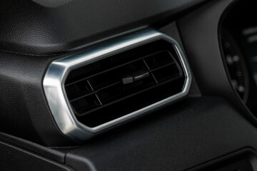 Car air conditioning. The air flow inside the car. Detail interior of a modern car.