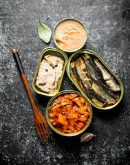 Canned fish in tin cans.