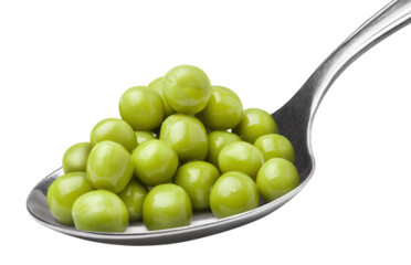 Delicious green peas in metal spoon cut out