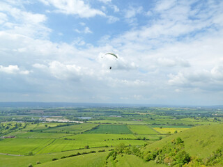 Paraglider flying at Westbury in Wiltshire 