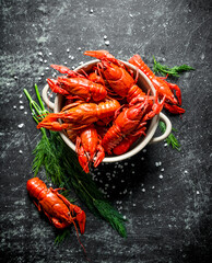 Deliciously cooked red crayfish in a bowl with dill. - 562826047
