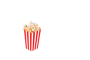 Glass with popcorn on a white background