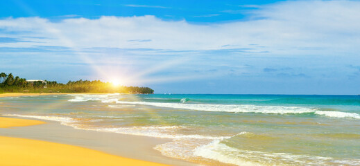 Summer sea and sun on blue sky. Wide photo.