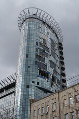 Fototapeta na wymiar Tower building damages by russian shell in Kiev, Ukraine