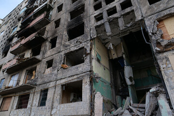 Fototapeta na wymiar Russian terrorists dropped bombs and destroyed building,killed civilians in Kyiv