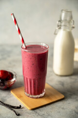 Pink smoothie drink with fresh fruits. Detox, healthy eating.