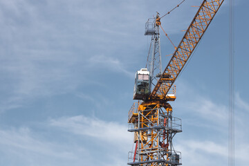 Construction site. Skyscrapper building and cranes.