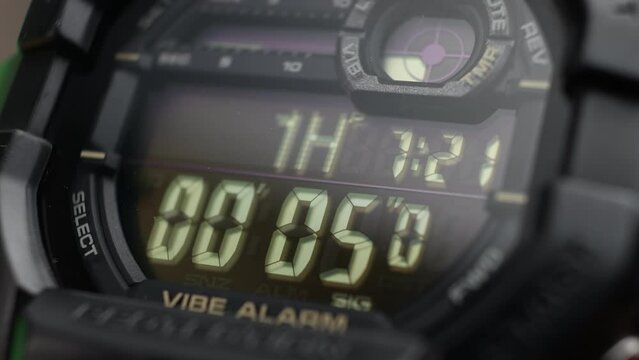 Macro close up of a tactical digital watch face functioning