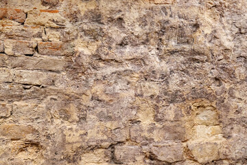 Old wall of brick and clay