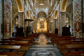 Fototapeta premium The central nave of the baroque and renaissance styled church San Luigi dei Francesi (St. Louis of the French) in Rome, Italy 