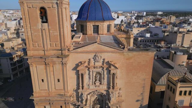 Discover the Beauty of Costa Blanca's Baroque Monument: Aerial Drone Footage of the Basilica Santa Maria in Elche, Spain and its Sculptures. Cinematic Revealing shot