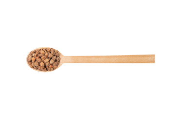 brown chickpeas on wooden spoon isolated on white background. nutrition. food ingredient.