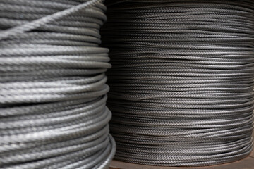 Coil of steel cable in industrial warehouse