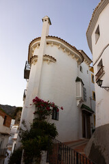External view of whitewashed building in Ojen, town in Andalusia, Southern Spain.