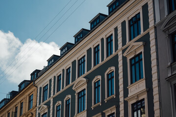Fototapeta na wymiar View of roof and facades of danish classical danish architecture in Copenhagen, Denmark