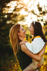 Mother and daughter laughing