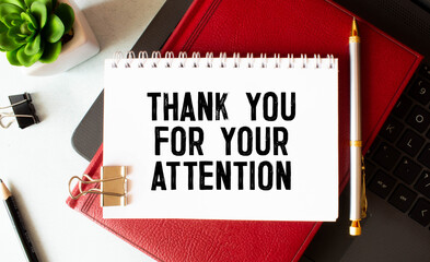 Creative concept Thank You For Your Attention text on notebook on wooden background.