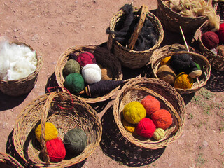 Baskets of wool in the Ccaccaccollo Community and Women's Weaving Co-op in the Sacred Valley in...