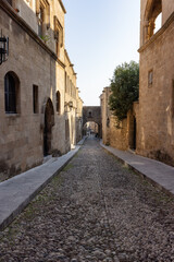 Fototapeta na wymiar Street of the Knights of Rhode in Greece. Historic Landmark in the Old Town.