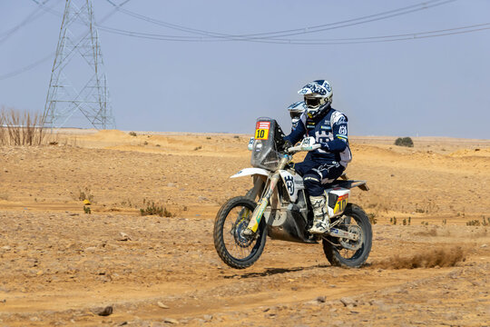 Al-Kharj, Saudi Arabia - January 10, 2023: Skyler Howes (No. 10) from and Luciano Benavides (No. 77) from Husqvarna Factory Racing Team running Stage 9 of rally Dakar 2023 edition
